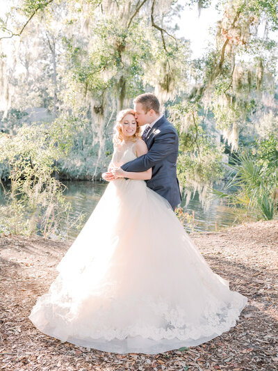 bride and groom in the moss on hilton head island