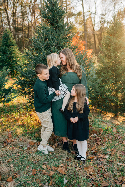 Extended family laughing in field  | Sharon Leger Photography