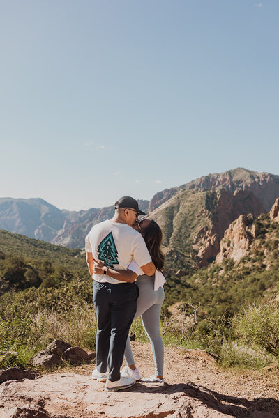 A couple kiss while hiking the Lost Mine Trail at Big Bend National Park