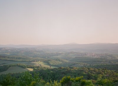 rolling hills of Tuscany italy sunset purple travel photo