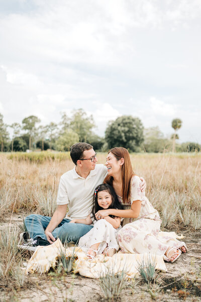 South Florida Family Photographer captures family laughing together during their session