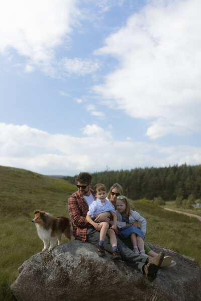 family in their aberdeen garden with chickens