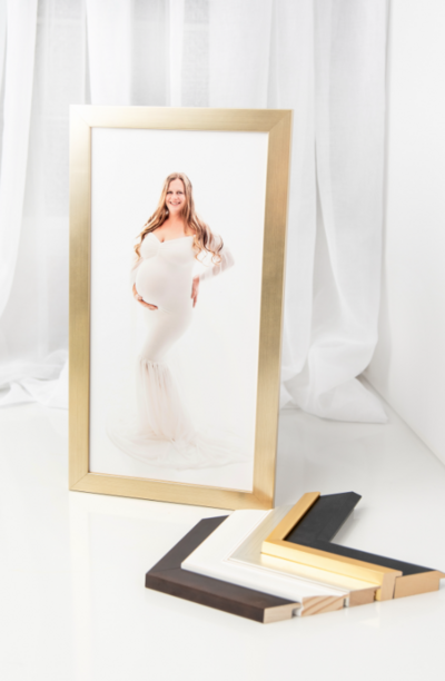 Maternity session photo print in a gold frame