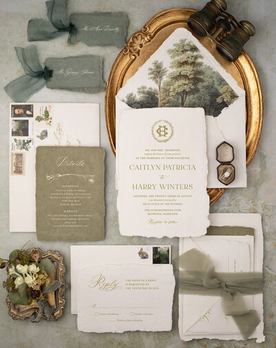 Elegant wedding invitation suite against a powder  blue background