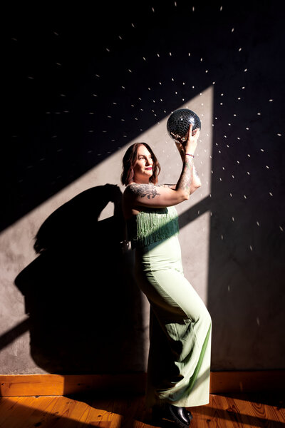woman with disco ball