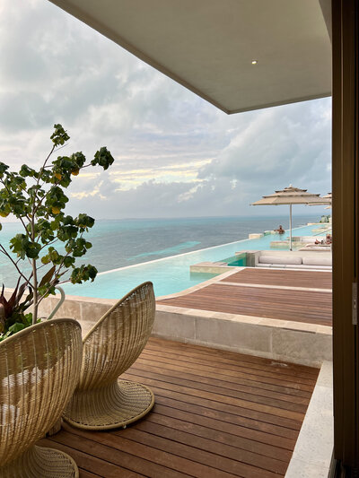 Breathtaking ocean vista from a luxury resort balcony, ideal for couples planning their dream wedding by the sea.