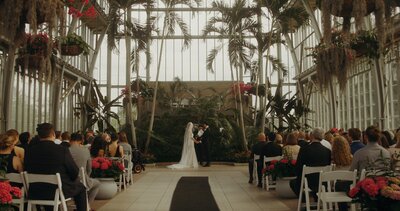 bride and groom at altar