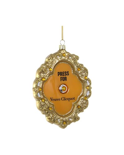 Vintage-inspired gold ornament shaped like a call bell with "Press for Champagne" and Veuve Clicquot branding.