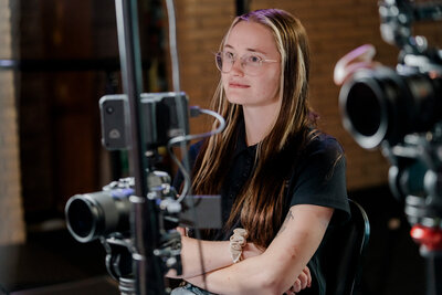 video producer payton mccabe interviews a subject on camera
