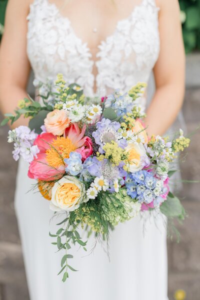 Gray ribbon, blue stamps, and a gold heirloom ring