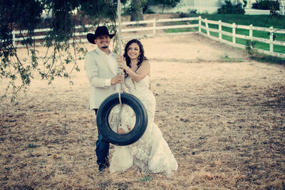 bride-and-groom-with-tire-swing