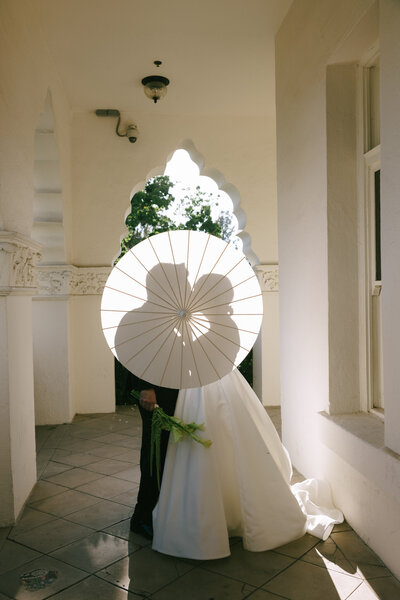 editorial, artistic image of a bride and groom at Brand Park in Glen Oaks, CA captured by Los Angeles documentary wedding photographer