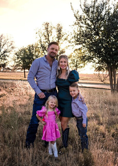 Alex Ingram, a realtor with Capital Realty Group and her family.