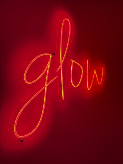LED sign that says "glow"