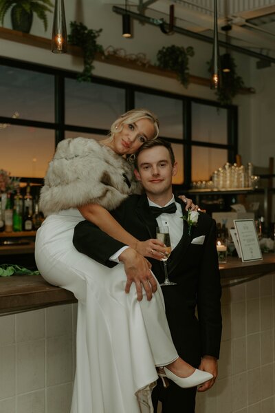 man holding womans cheek