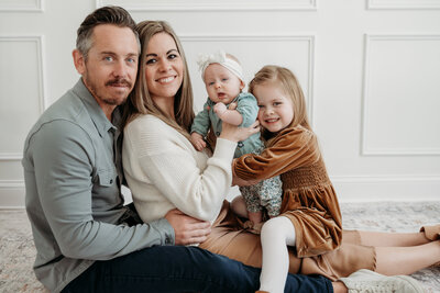 Candid family photography session with two kids in Bartlett, IL studio, by Moments by Meli