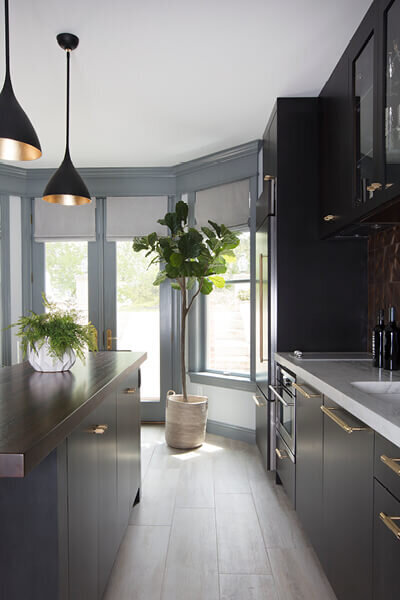 Modern kitchen designer in Boston renovates two spaces in a Westwood remodel, blending fresh design with functional kitchen and bath updates.