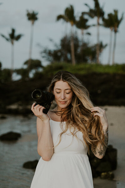 northern california photographer holding camera
