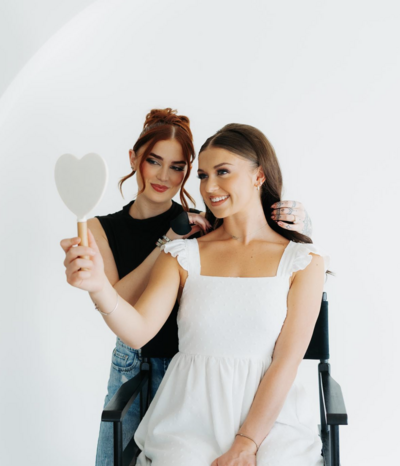 Bride seeing final look after fill glam wedding day makeup