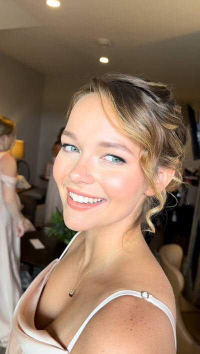 Bride glowing in soft glam makeup with radiant skin, blush tones, and soft eyes — styled by Klover Beauty for a Maryland wedding day.