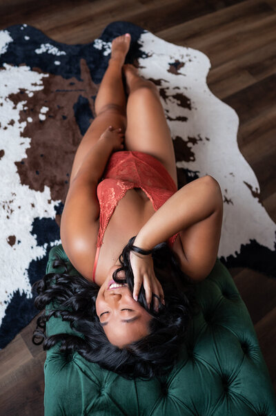 woman in a boudoir photoshoot on the floor