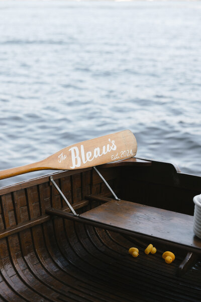 bride and groom embracing on beach engagement session