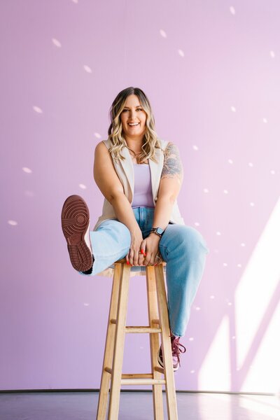 photographer standing with camera