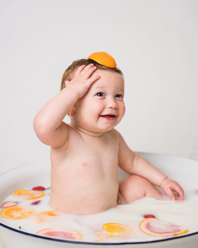 1-year-old milk bath with flowers — fine art baby milestone photography in Sausalito