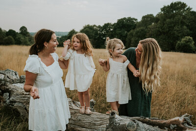 two women with two young girls family photography
