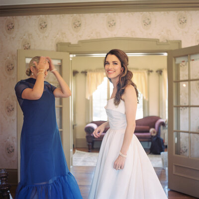 a film photograph from the Yashica Mat 124g of a bride getting ready in a mansion