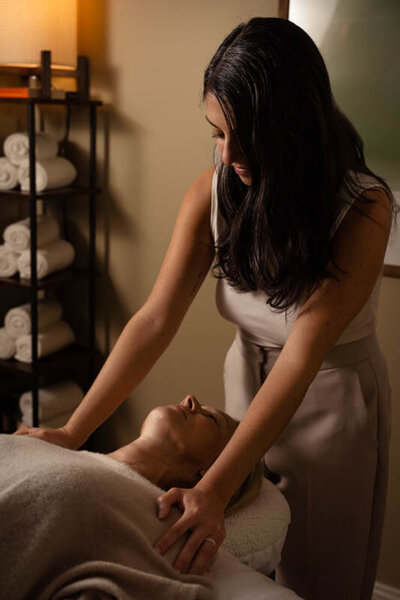 action shot of a naturopathic doctor with her client