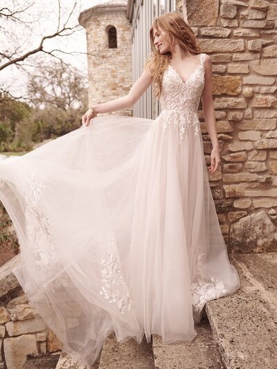 Halter Neck Sheath Wedding Dress. You have lovely shoulders and a boho soul. This halter-neck sheath wedding dress is designed to complement both.