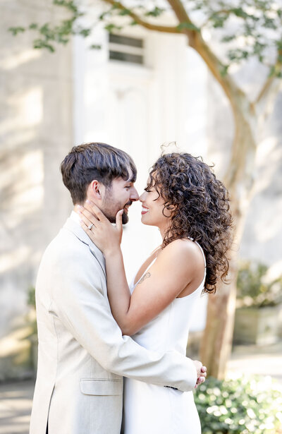 couple kissing on Chalmers Street during engagement session