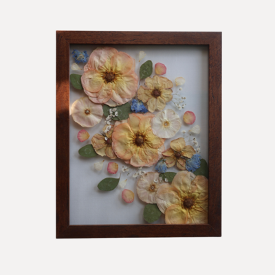 Archive Floral Preservation. Red and yellow pressed floral frame.