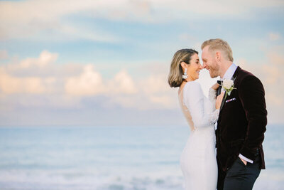 Palm Beach wedding couple laughing together