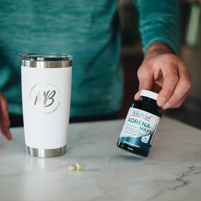 Branded product photo of a male hand holding a supplement jar, perfect for health and wellness brand marketing