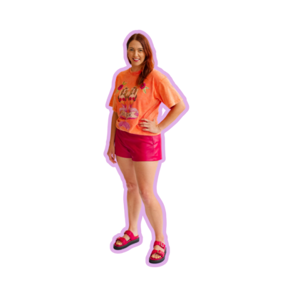 Carley with her hand on her hip with purple outline