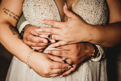 Bride and groom hands posed at Raleigh wedding