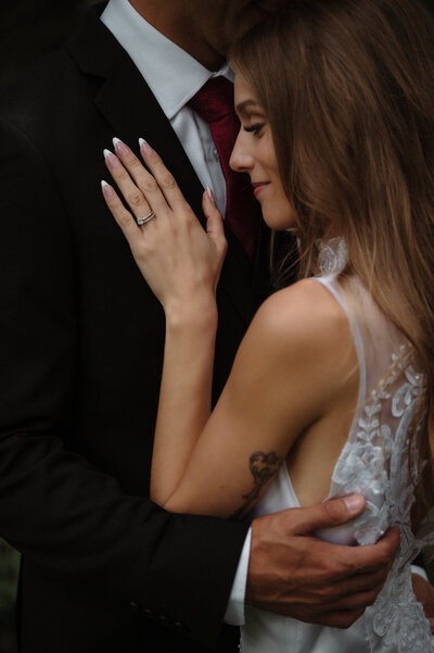 Bridal portrait in Puerto Vallarta Mexico at Dreams Bahia Mita resort destination wedding getting ready photos with engagement ring and glass of champagne