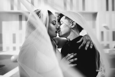 Two Brides Kissing Black and White Image