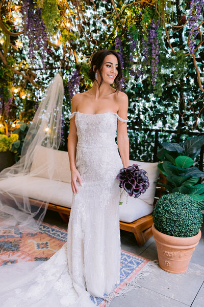 Gorgeous bride posing in her wedding dress at The Beekman Hotel in Downtown NYC.