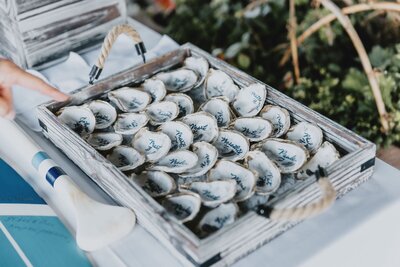 Oyster shells with calligraphy for wedding at the Weekapug Inn in Rhode Island