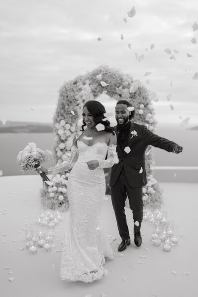 A romantic stylish elopement at Aenaon villas  Santorini