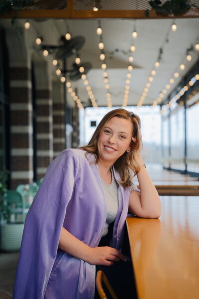 Female entrepreneur and mompreneur Jordan Schram balancing business and family life.