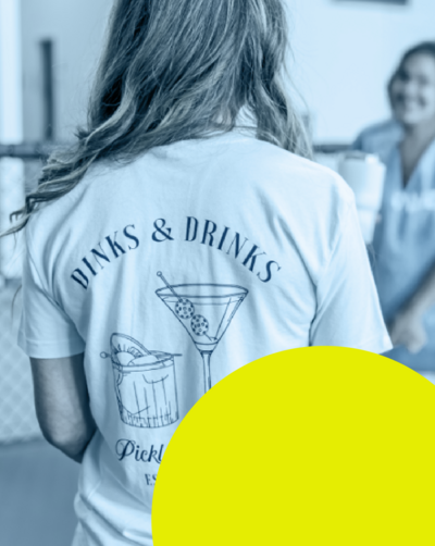 woman with pickleball racket