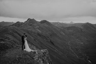 Couple elopes in the San Juan Mountains on top of a mountain