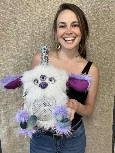 Natalie holding Handmade fabric sculpture