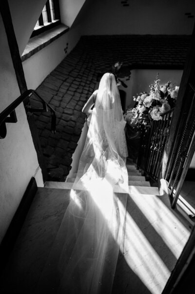a married couple kisses on their wedding day outside of Bonnet Island Estate 