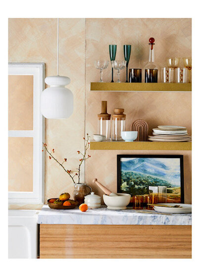 Floral styling and neutral interiors featured in interior magazine