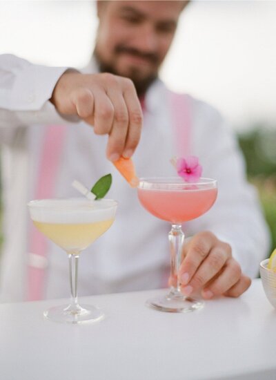 Bartender making cocktails